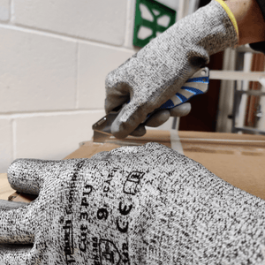 Using cut 3 pu gloves when cutting open a box